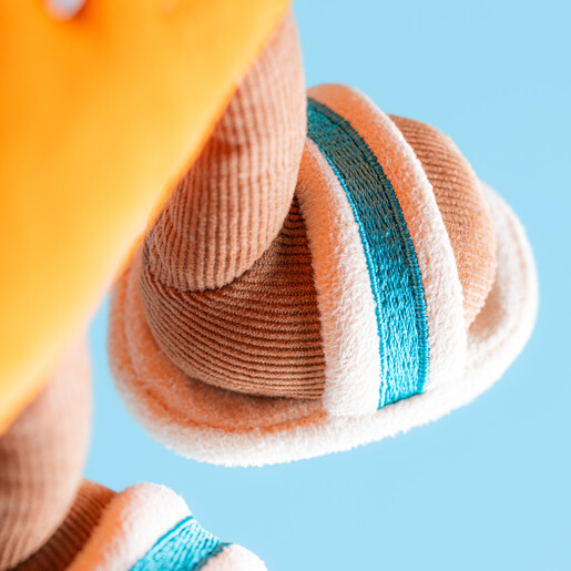 Tiny White Pool Sliders on Feet of Life Ring Plushie