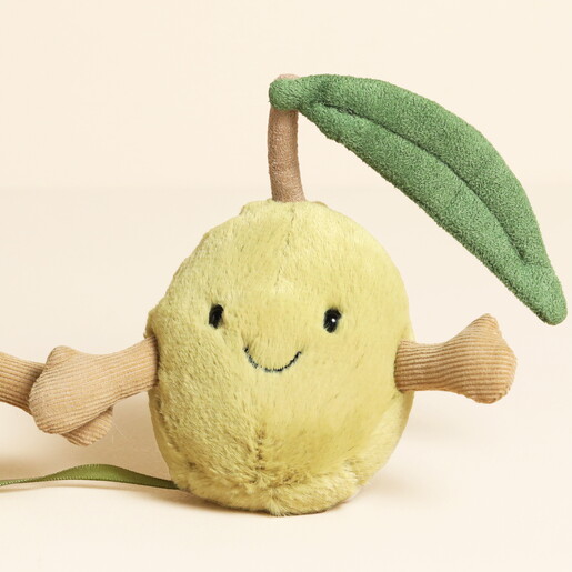 Close Up of One Olive Plushie With Outstretched Arms