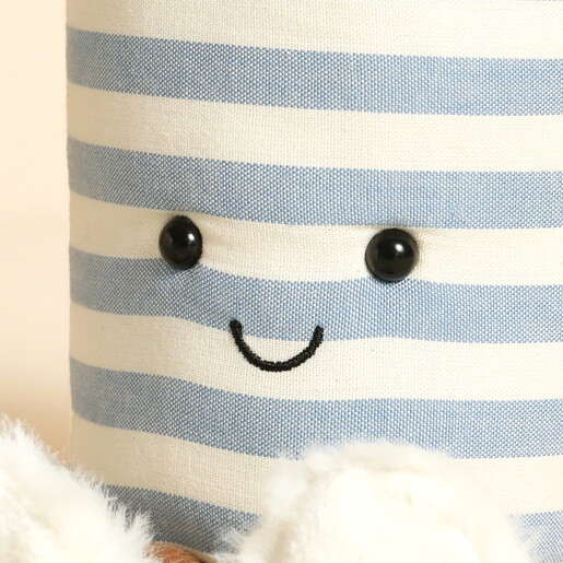 Close Up of Smiling Face on Tea Cup Plush Toy