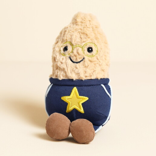 A Tiny Peanut Plush Toy Wearing a Superman Outfit