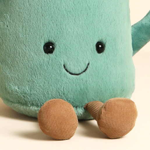 Close Up of Face on Plushie Watering Can