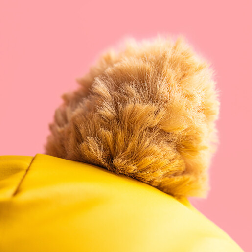 Close Up of Bear Tail Poking Through Hole in Back of Dungarees