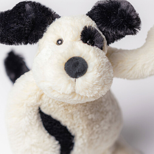 close up of black and white fur patches