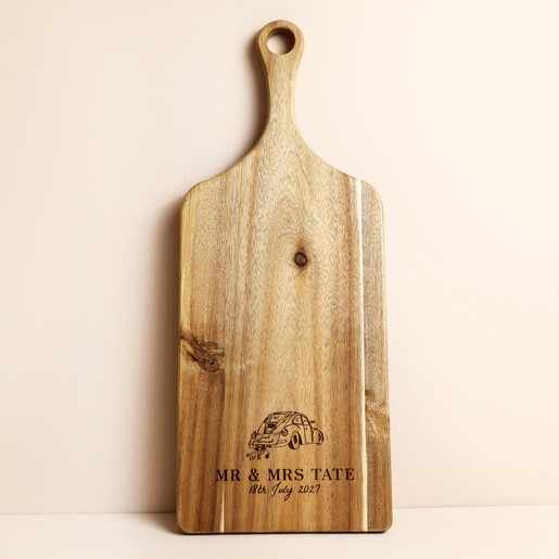 Wooden paddle board with engraved wedding car illustration and personalised names and date