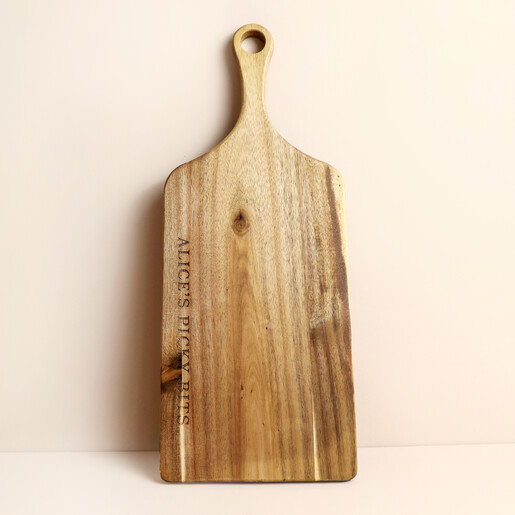 Personalised acacia wood picky bits serving board shown standing upright