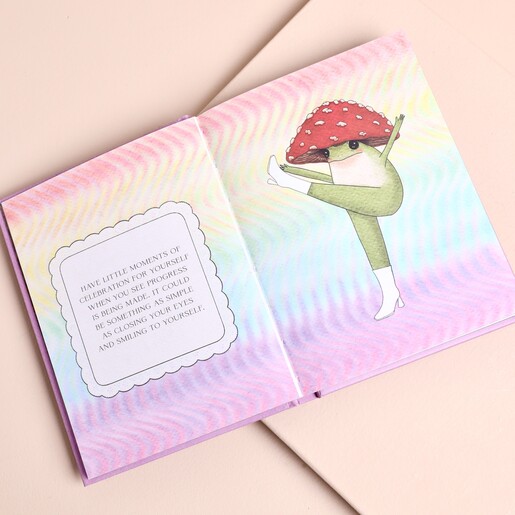 Illustrated open page from The Little Frog's Guide to Hope showing an uplifting quote
