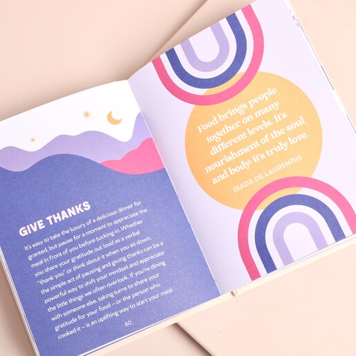 Open page of Good Evening Rituals book showing evening gratitude exercise