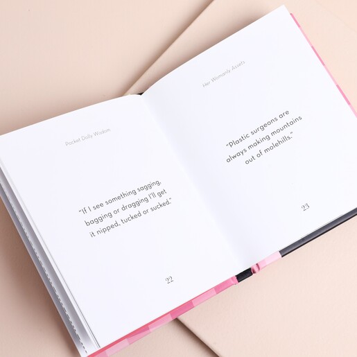 Open Pocket Dolly Wisdom book showing humorous quotes printed on pages