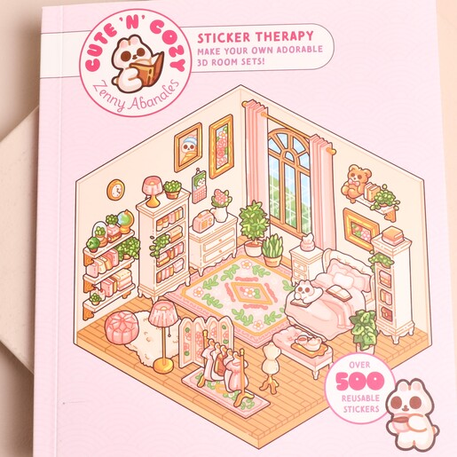 Close up of Cute N Cozy sticker therapy book front cover illustration by Zenny Abanales