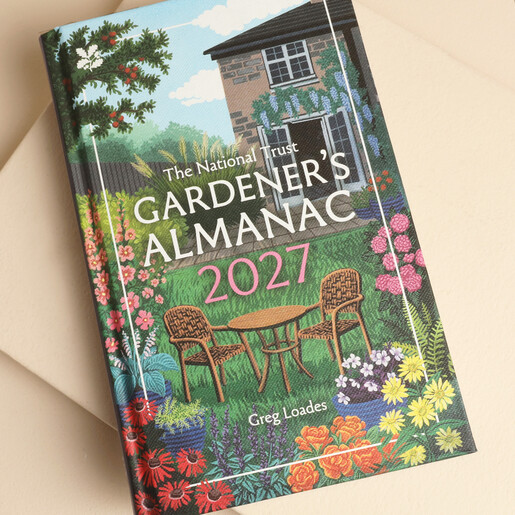 Close up of the colourful illustrated front cover of the Gardener's Almanac 2027