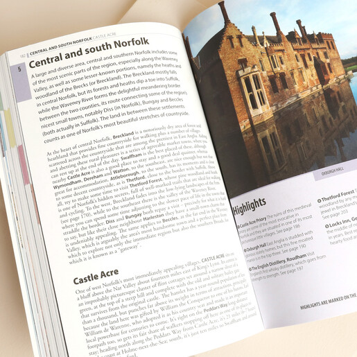 Open page inside the Rough Guides Norfolk and Suffolk book detailing Castle Acre.