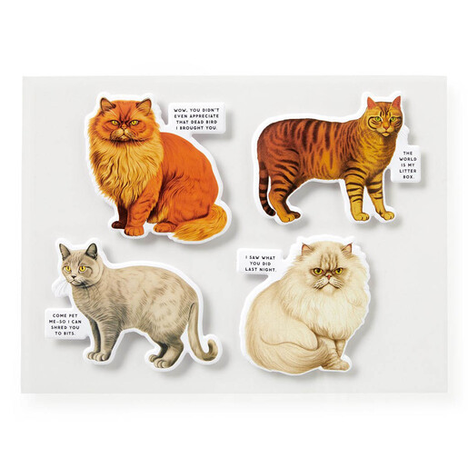 Four bonus puffy cat stickers included with the Moody Cats jigsaw puzzle