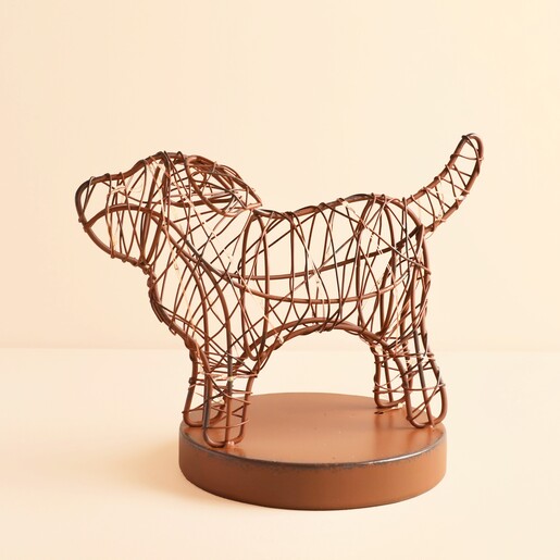Brown wire dog silhouette light on a round base unlit