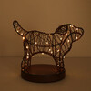 Brown wire dog lamp illuminated with glowing warm LED fairy lights