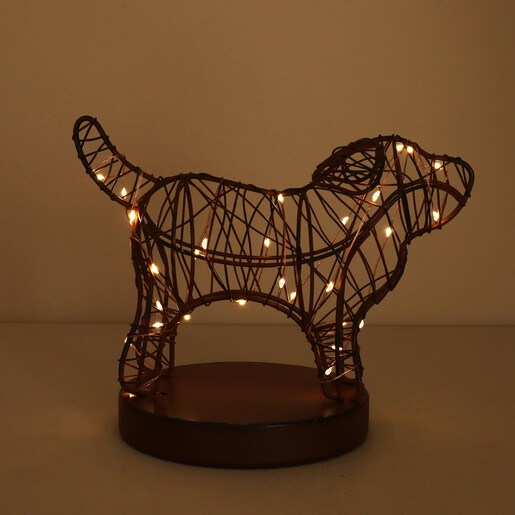 Brown wire dog lamp illuminated with glowing warm LED fairy lights