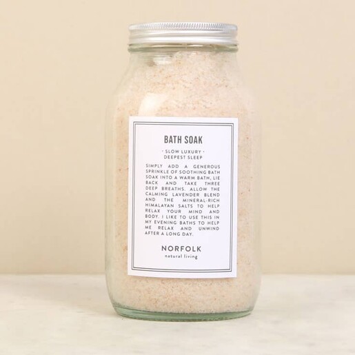 glass bottle of vegan bath salts