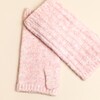 Close-up of the light pink marl ribbed knit texture on fingerless gloves