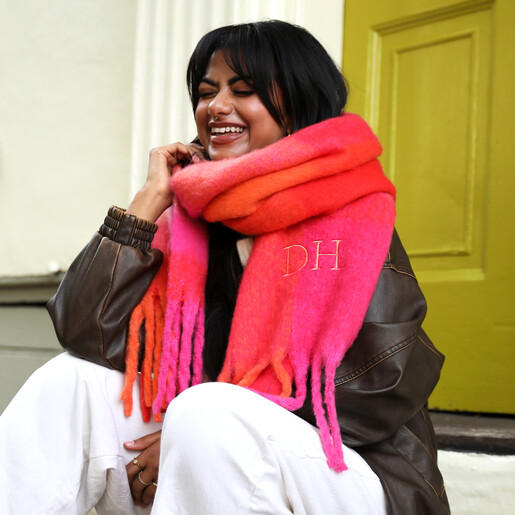 pink scarf on model against bright green door