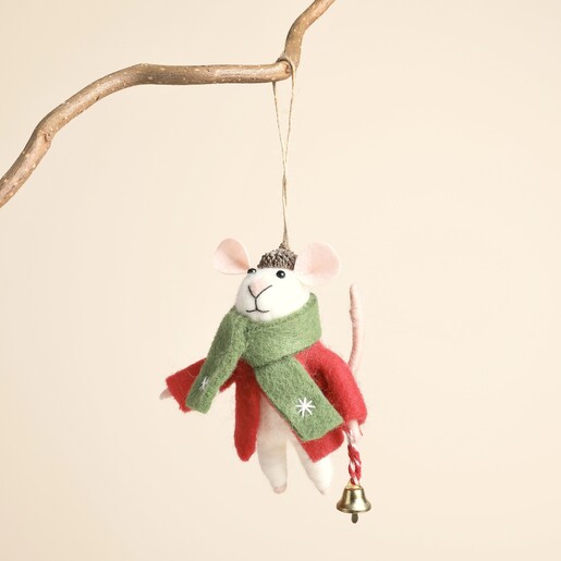 Felt Christmas mouse hanging from a rustic wooden branch against a neutral background