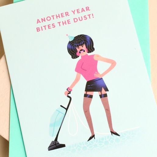 Close-up of humorous Freddie Mercury illustration and birthday message on card.