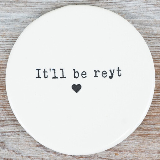 Round white ceramic coaster with black It'll be reyt text and a heart