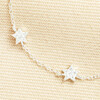 close up of crystal star charms 