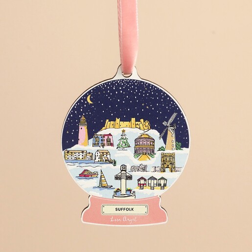 Close up of the wooden Suffolk snow globe hanging decoration featuring local landmarks