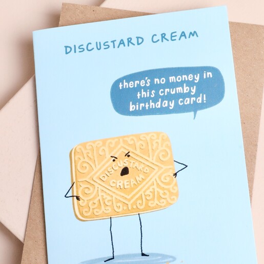 Close-up of the humorous Discustard cream biscuit illustration on pale blue card