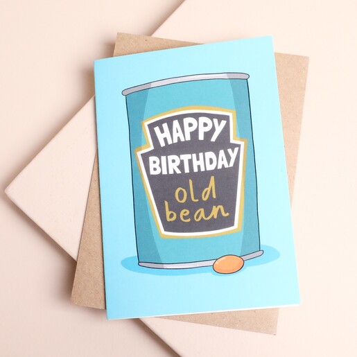 Happy Birthday Old Bean greeting card with a baked bean tin illustration and kraft envelope