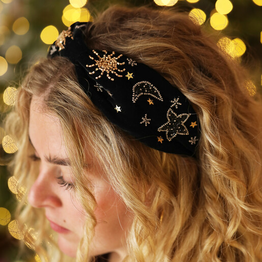 black velvet headband on blonde hair