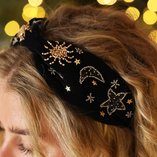 close up of celestial details on headband