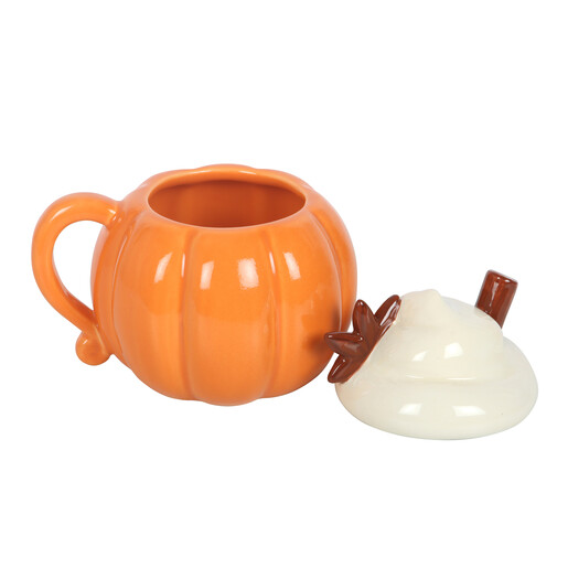 Ceramic pumpkin mug shown open with the whipped cream lid beside it
