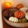 lifestyle shot of autumnal paper pumpkin decorations