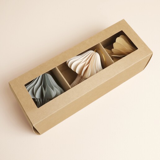 Set of three pleated paper toadstool decorations in a kraft window gift box