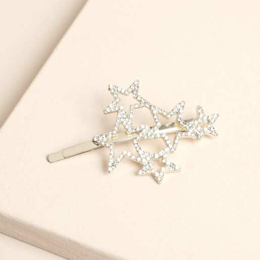Gold hair slide featuring an interlocking cluster of crystal-embellished stars