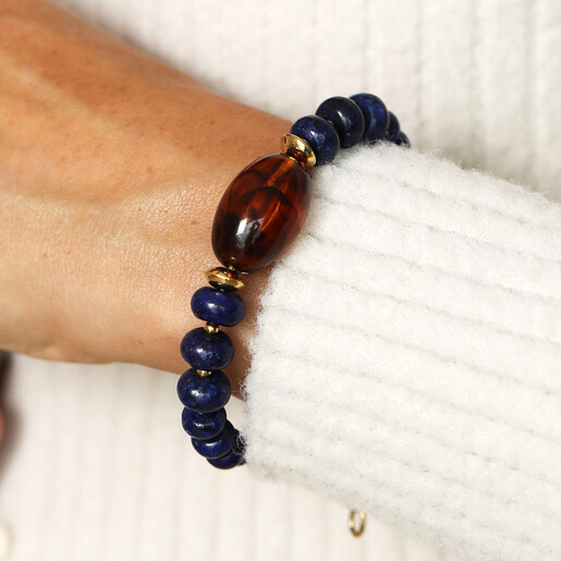 chunky blue beaded bracelet on model 