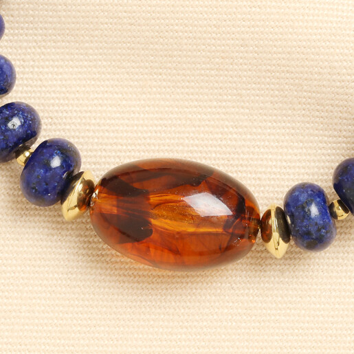 close up of amber tortoiseshell bead