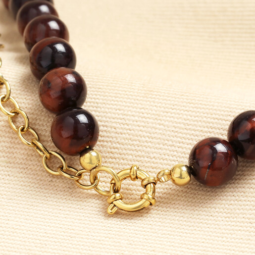 Close up of gold stainless steel spring ring clasp and extender chain