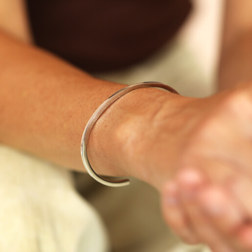 waterproof bangle in silver on model