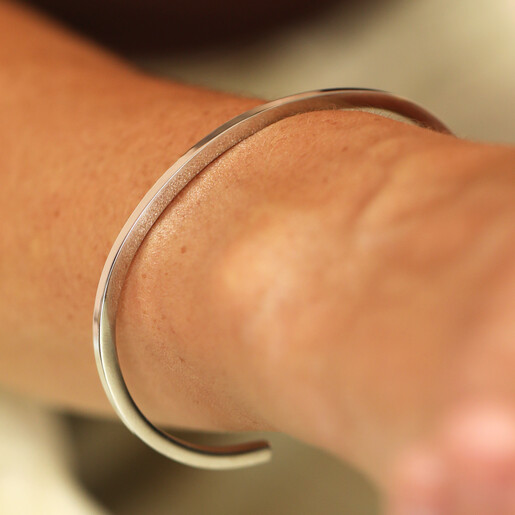 model shot of silver stainless steel cuff