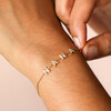 model shot of gold crystal charm bracelet