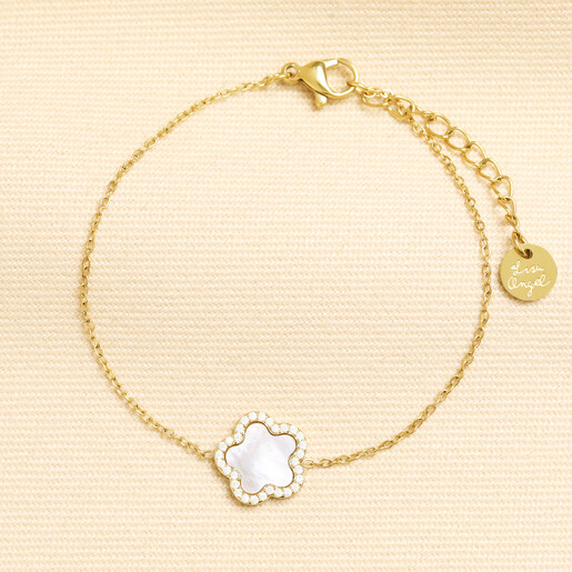 Gold stainless steel chain bracelet with pearlescent flower charm and lobster clasp