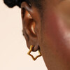 stainless steel hoop earrings in gold on model
