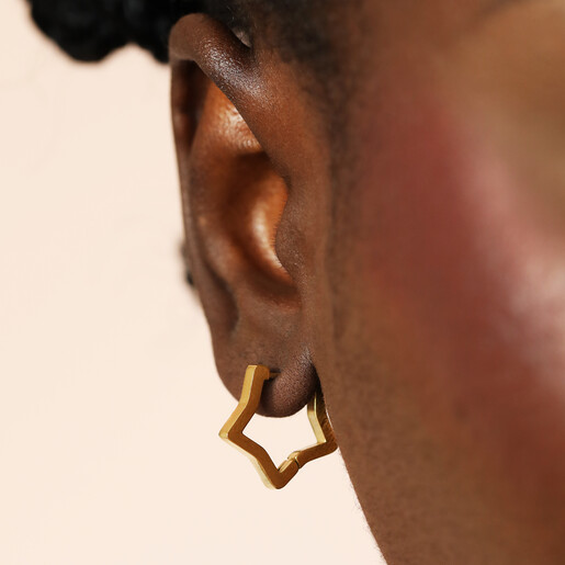 stainless steel hoop earrings in gold on model