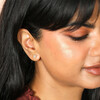 stud earrings on model