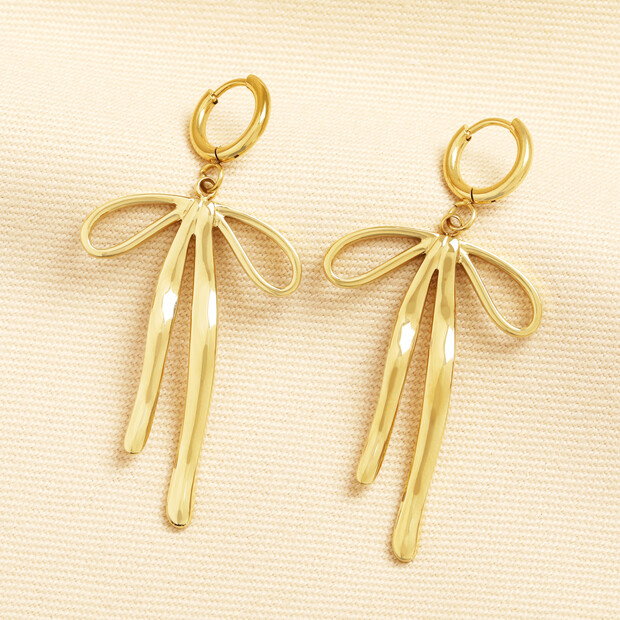 Stainless Steel Large Bow Charm Huggie Hoop Earrings in Gold