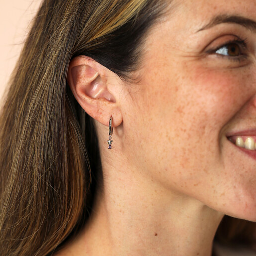 model shot of silver charm hoop earrings