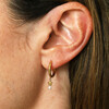 model shot of waterproof gold earrings