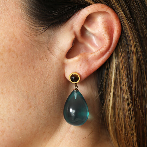 blue resin drop earrings on model