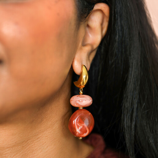 waterproof stainless steel earrings in red, pink, and gold